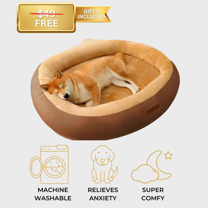 Brown Anxiety-Free Dog Bed with a dog resting comfortably, featuring calming qualities to relieve separation anxiety, with a gift included with purchase.