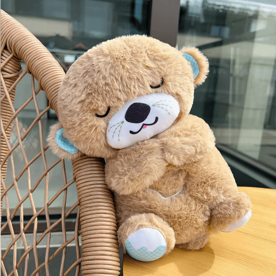 Front view of a brown Calming Otter dog toy leaning on a chair, designed to soothe and relieve dog separation anxiety.