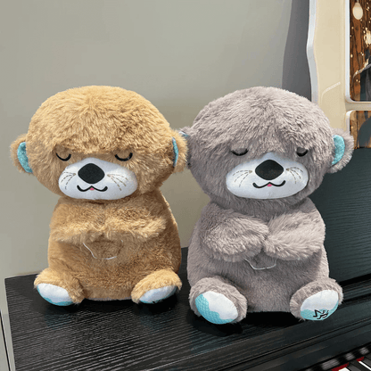 Front view of brown and grey Calming Otter dog toys next to each other, designed to ease dog separation anxiety.