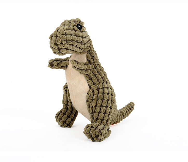 Side angle of the green Jurassic Chew dinosaur dog toy, showcasing its soft corn velvet texture and durable PP cotton stuffing. White background.