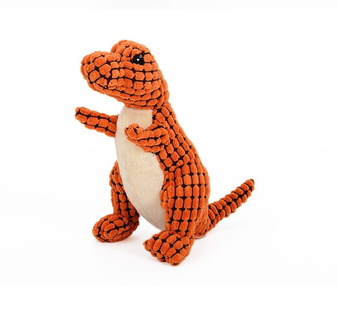 Side angle of the orange Jurassic Chew dinosaur dog toy, displaying its soft corn velvet exterior and resilient PP cotton filling. White background.