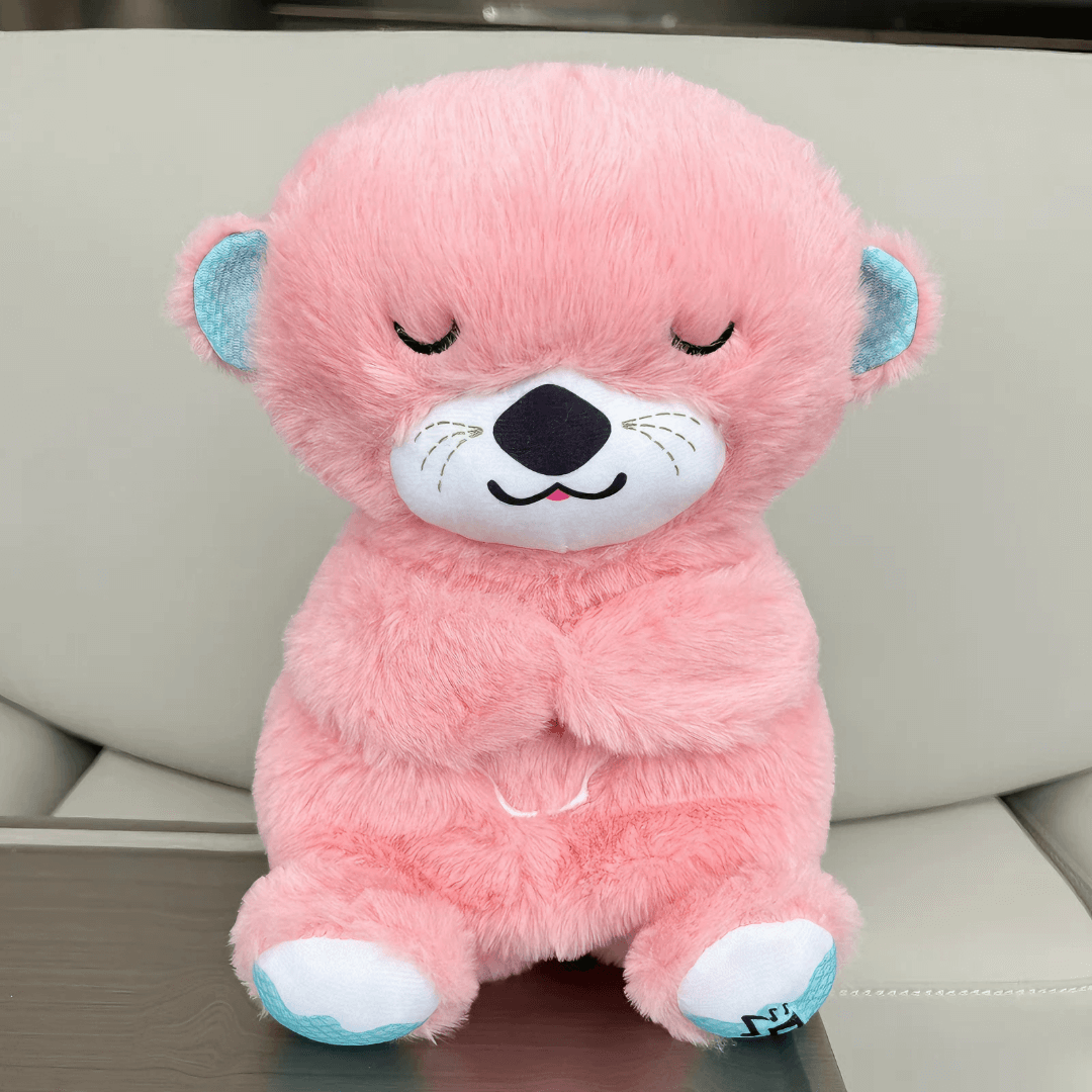 Front view of a pink Calming Otter dog toy, designed to comfort and alleviate dog separation anxiety with soothing features.