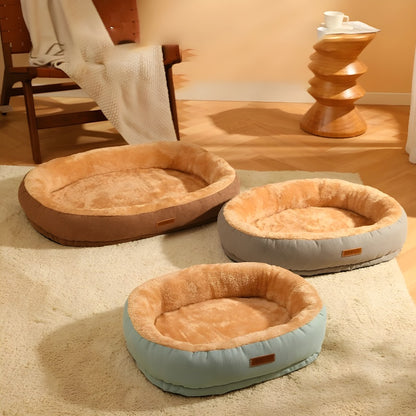 Above angle showing three Anxiety-Free Dog Beds: XL brown, L light green, and L light grey, designed to relieve separation anxiety and provide comfort for dogs of various sizes.